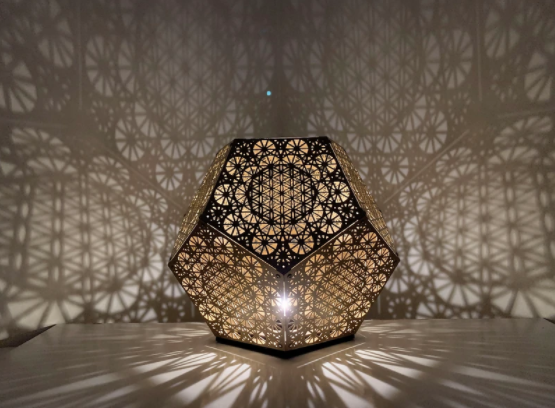 Dodecahedron Lamp with an inset Flower of Life pattern in each of the 12 pentagonal faces