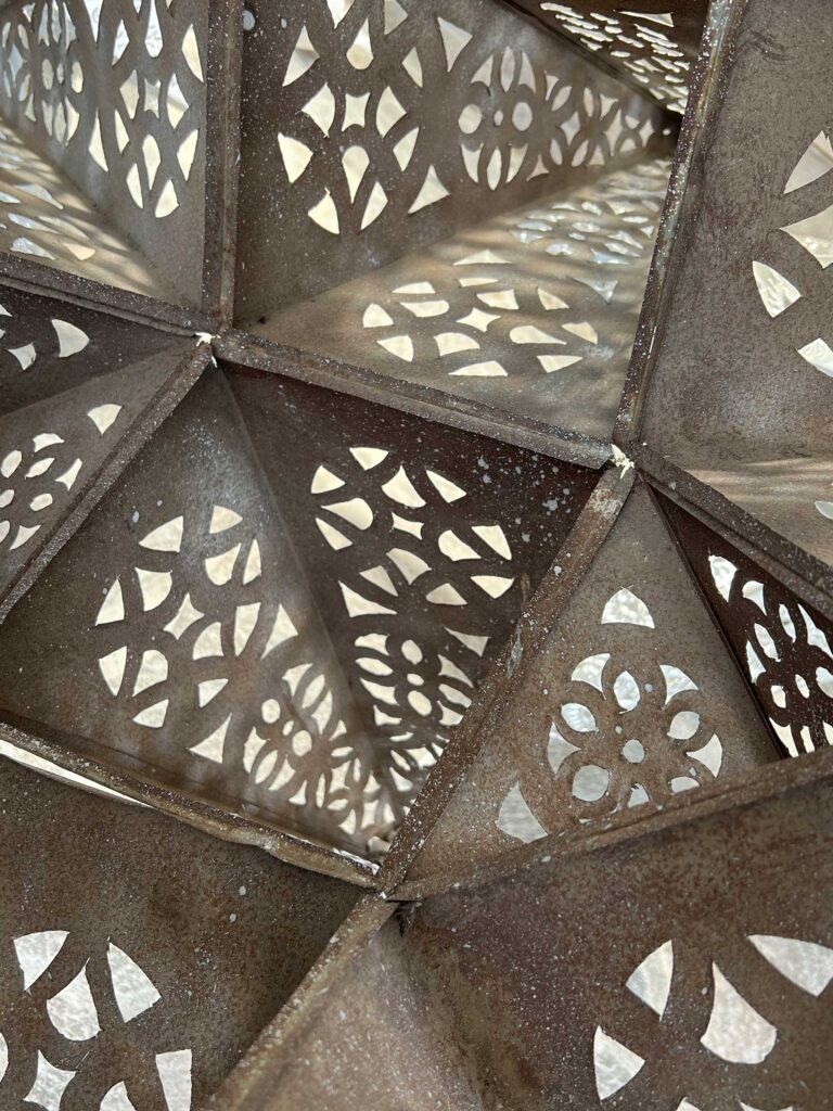 interior of a metal stellated polyhedron; San Miguel de Allende, Mexico